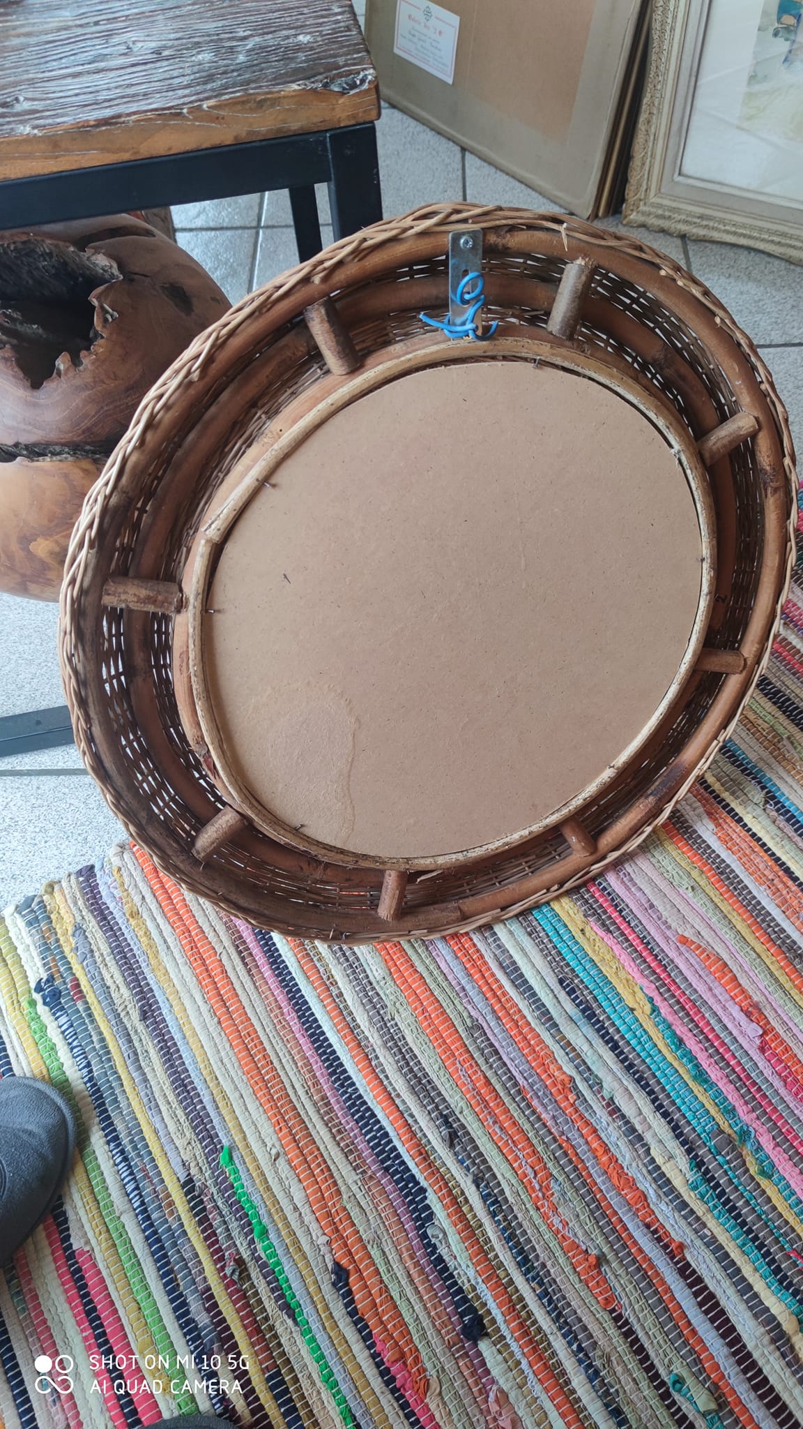 Miroir en rotin de forme sphérique vers 1970