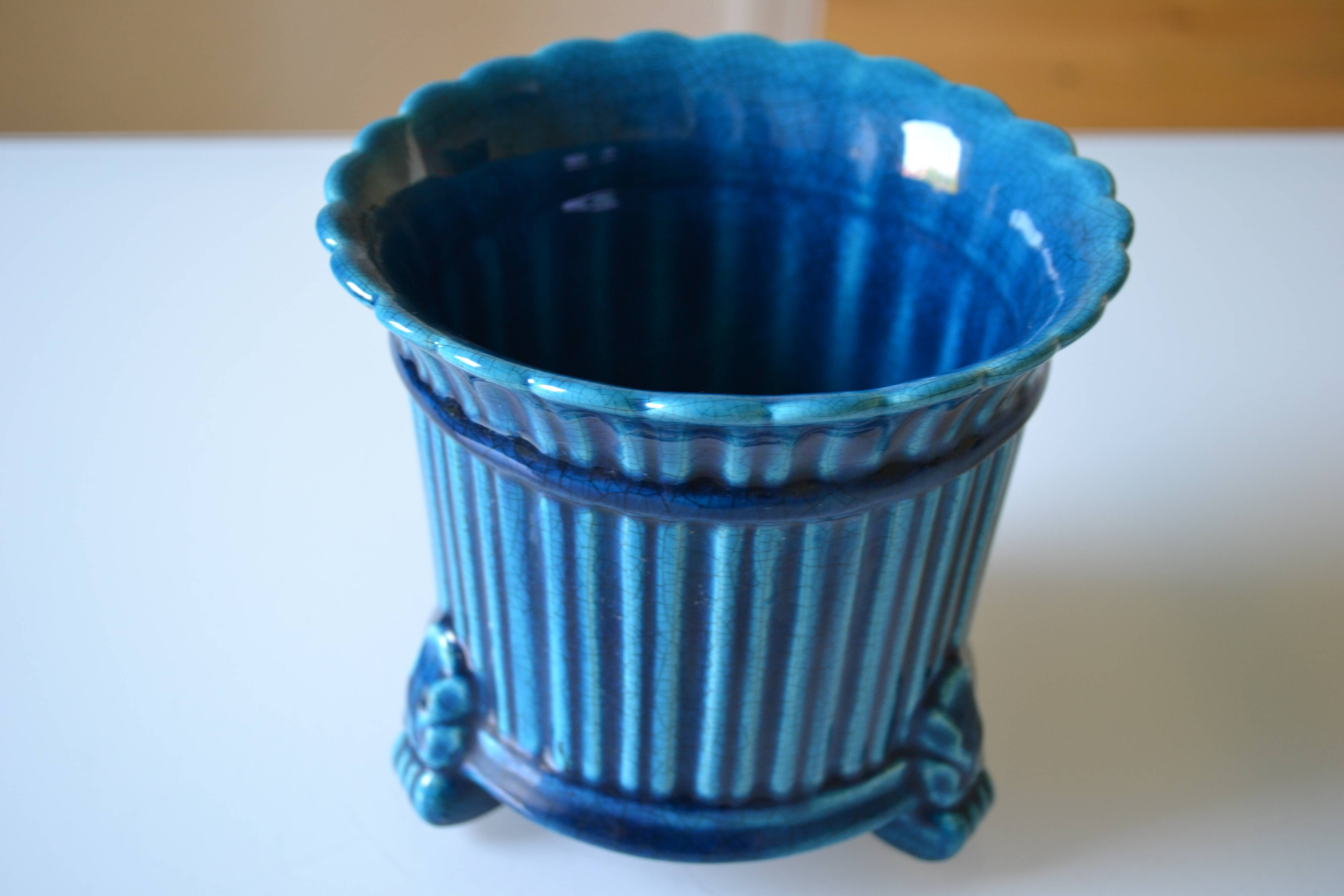 Cracked blue ceramic cache pot