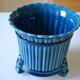 Cracked blue ceramic cache pot