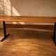 Vintage rectangular coffee table with a wooden top and black metal base, 1960s.