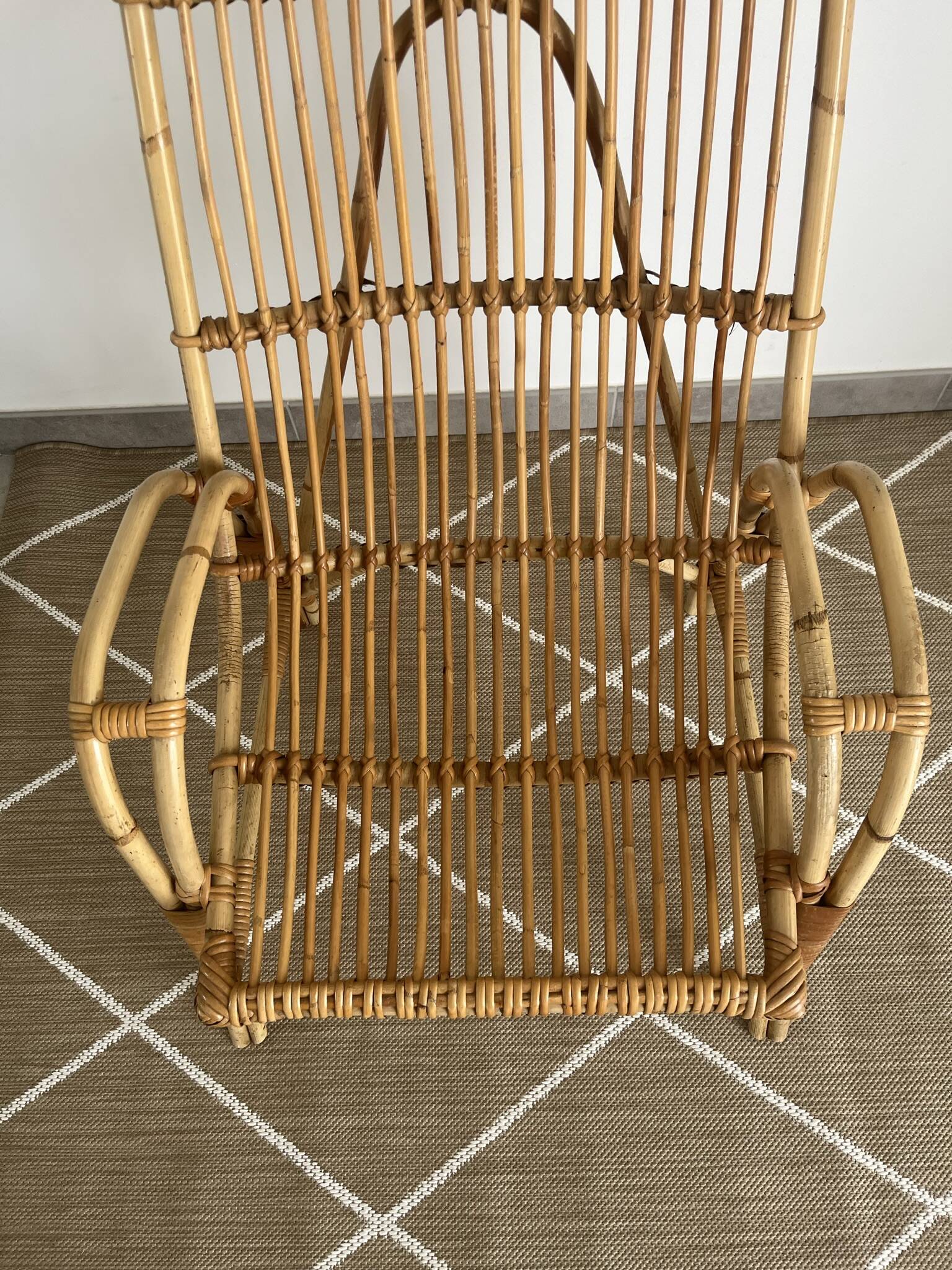 Large rattan armchair