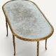 Maison Baguès coffee table in gilded bronze and aged mirror – 1950s