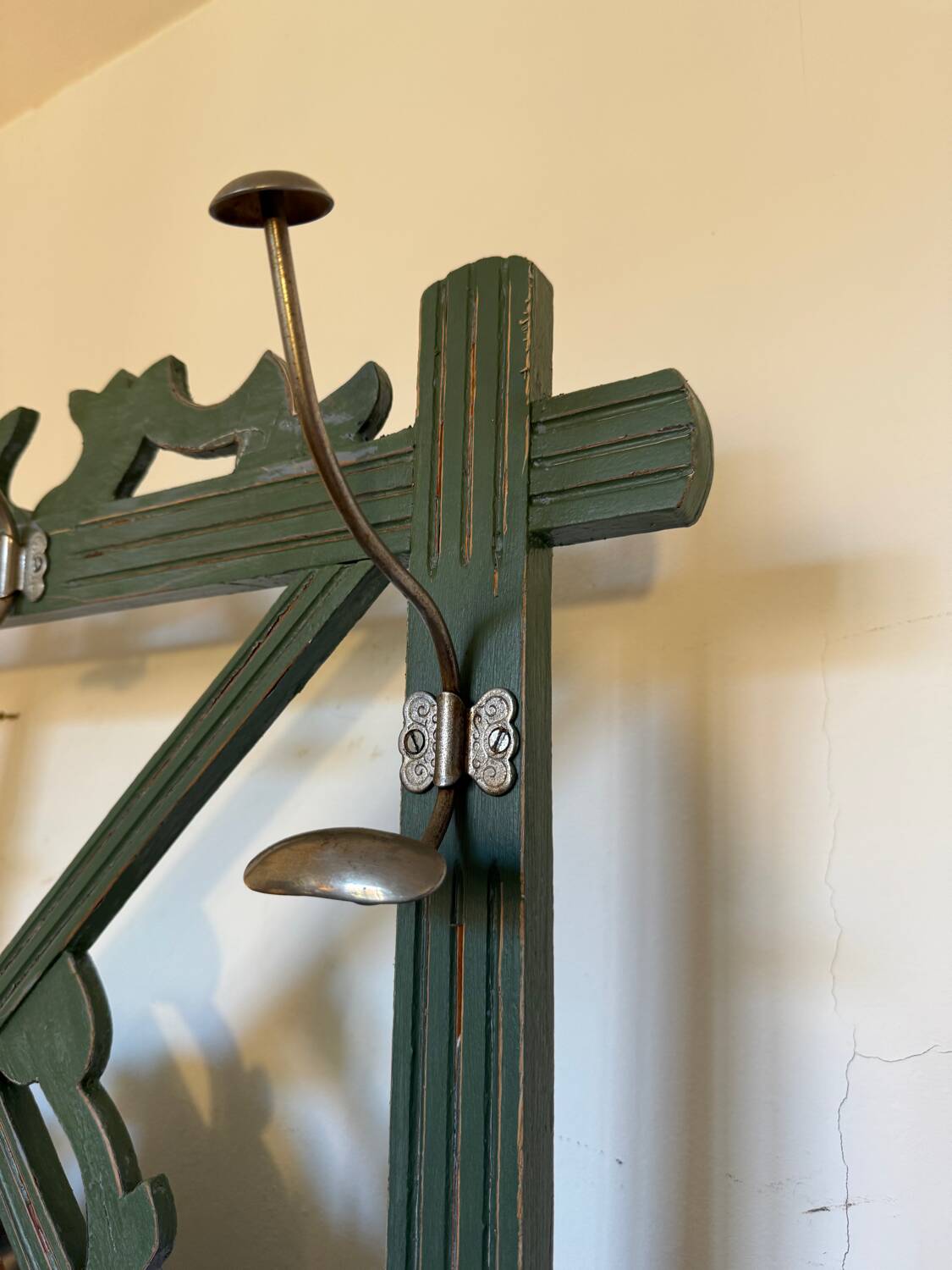 Art Deco coat rack in green patinated wood