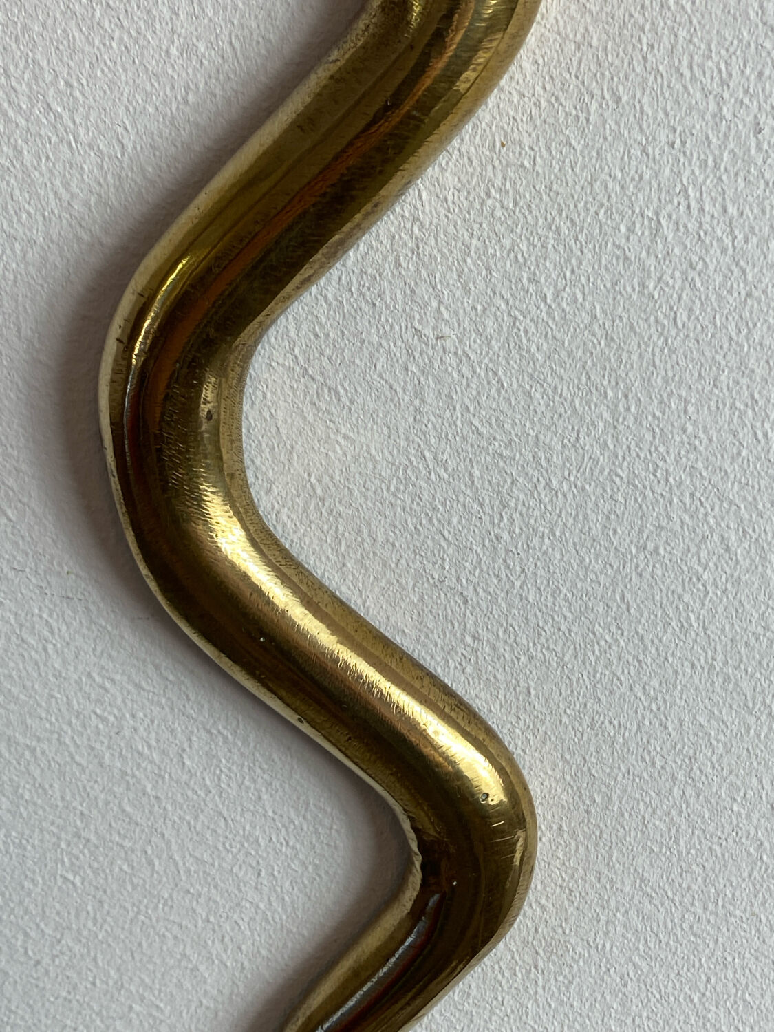 Large brass cobra wall candle holder