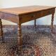 Cherry wood desk with a leather top.