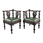 Pair of corner armchairs in carved wood, 19th century