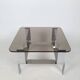 Table basse métal chromé et verre fumé 70