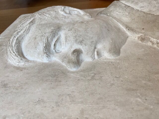 Bust of a man to hang