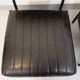 Set of 2 vintage modernist armchairs in black faux leather and metal.