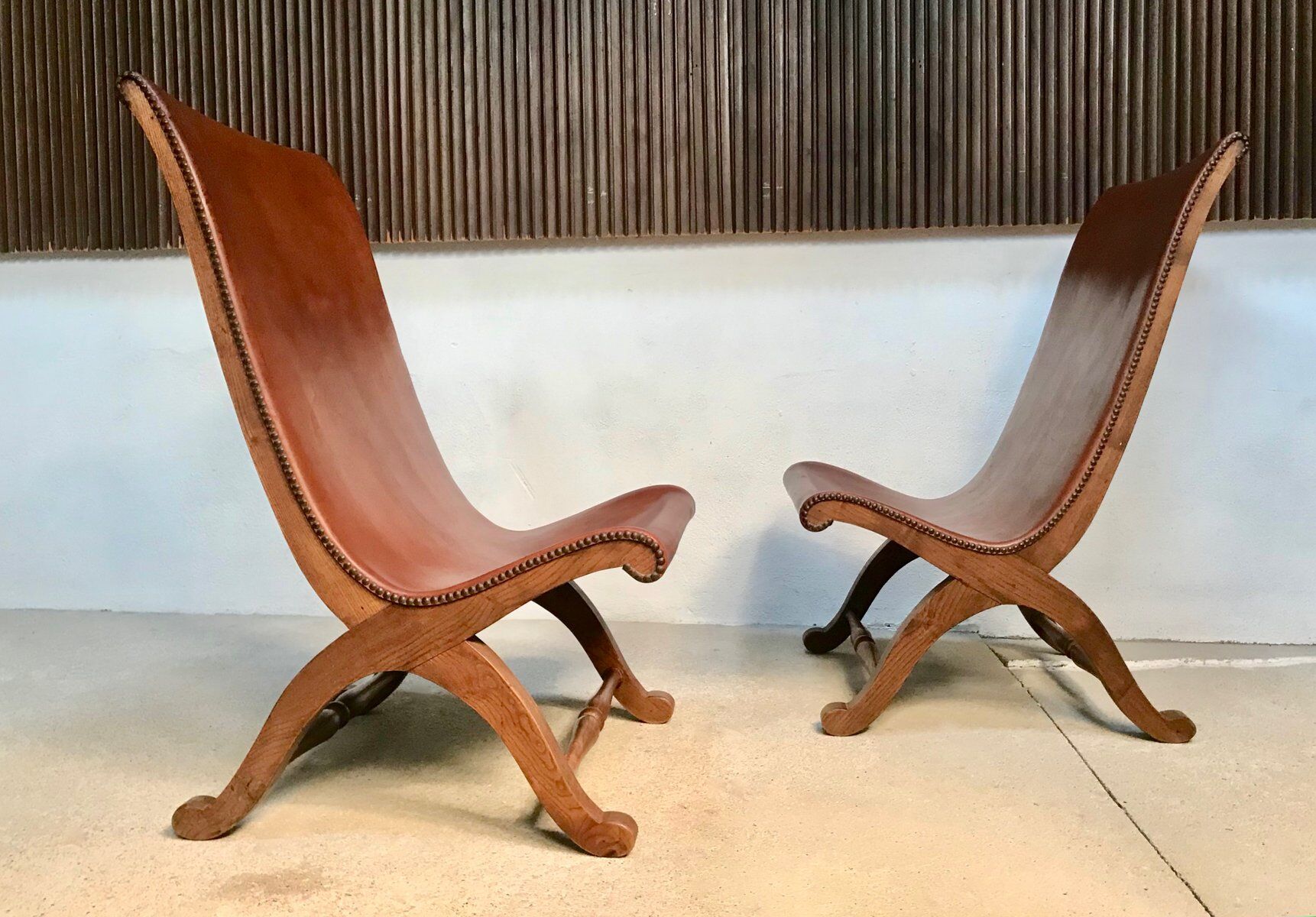 Set of 2 Spanish high-back leather slipper chairs by Pierre Lottier, 1950s