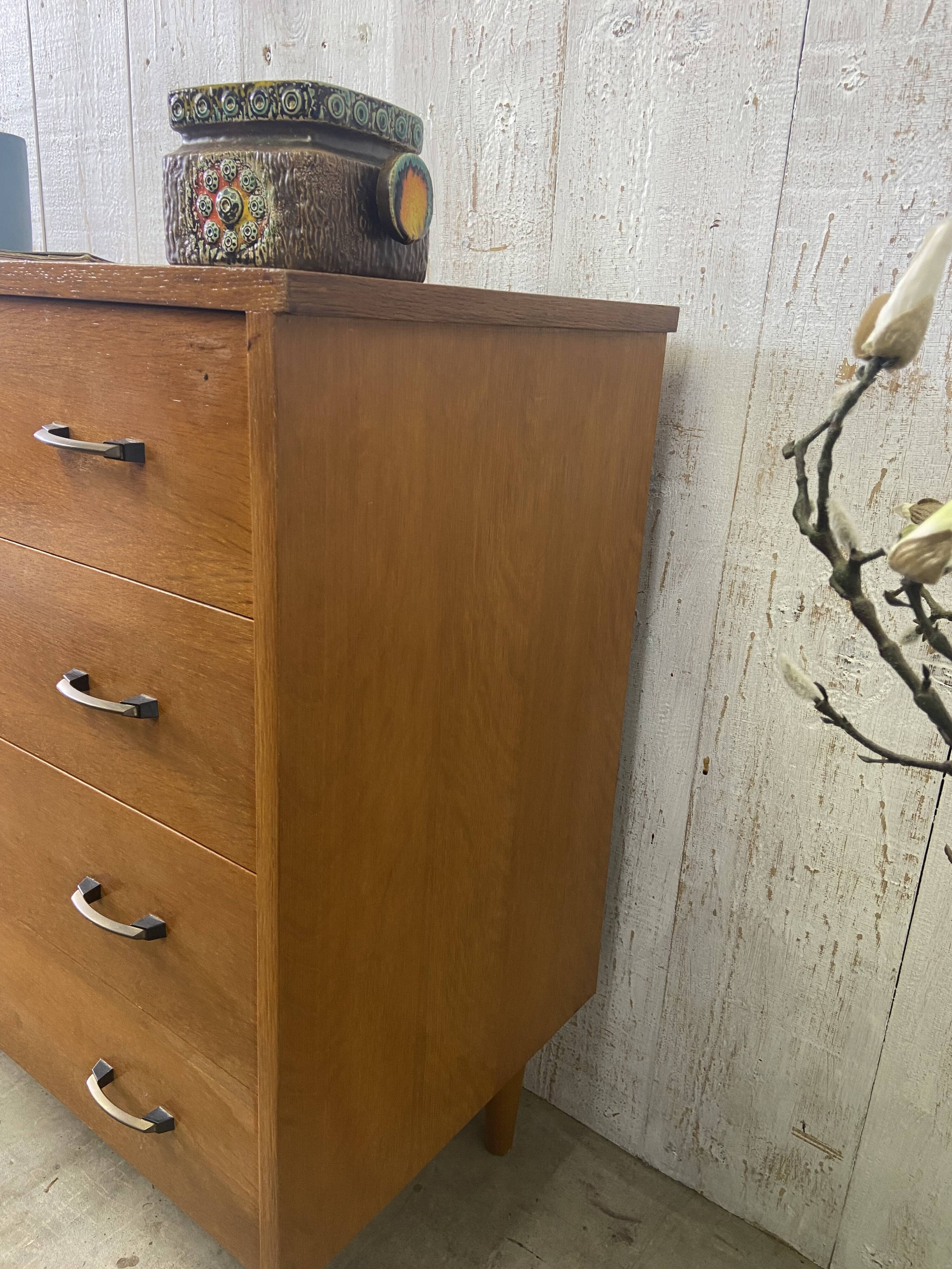 Vintage chest of drawers with conical legs