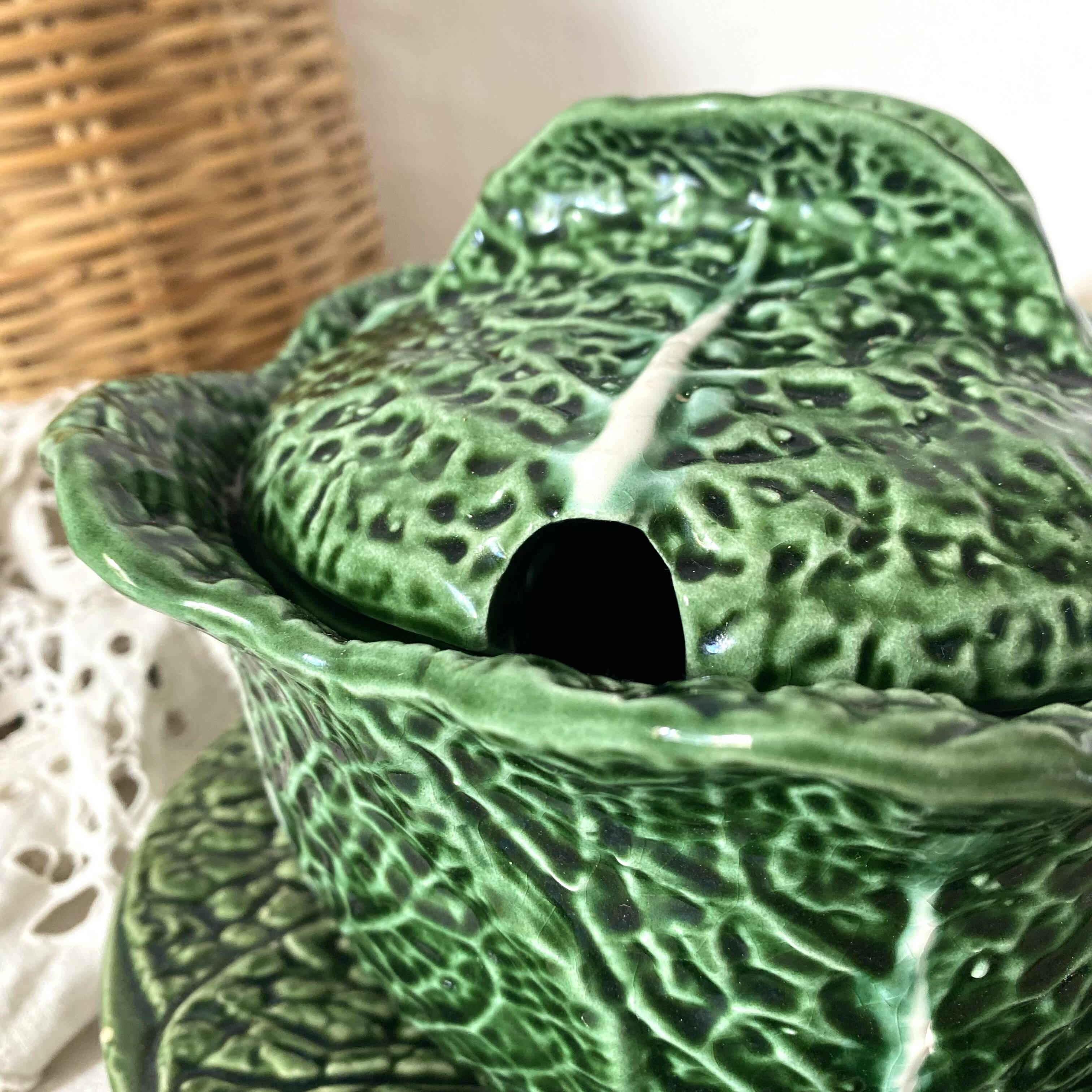 Soup tureen and green cabbage dish in barbotine
