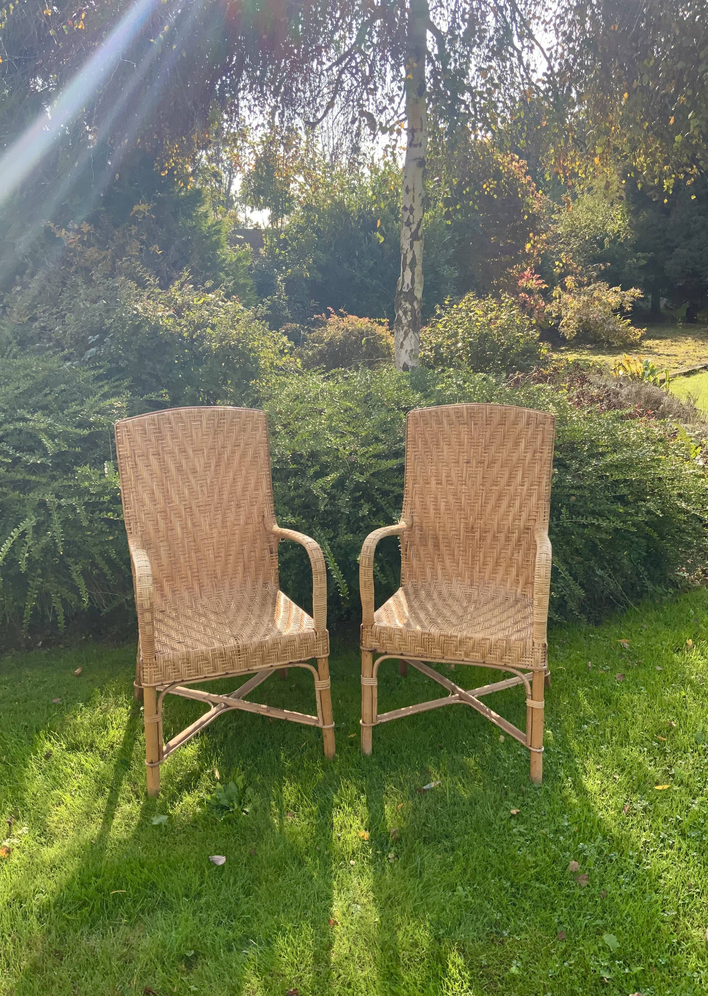 Pair of old wicker rattan chairs
