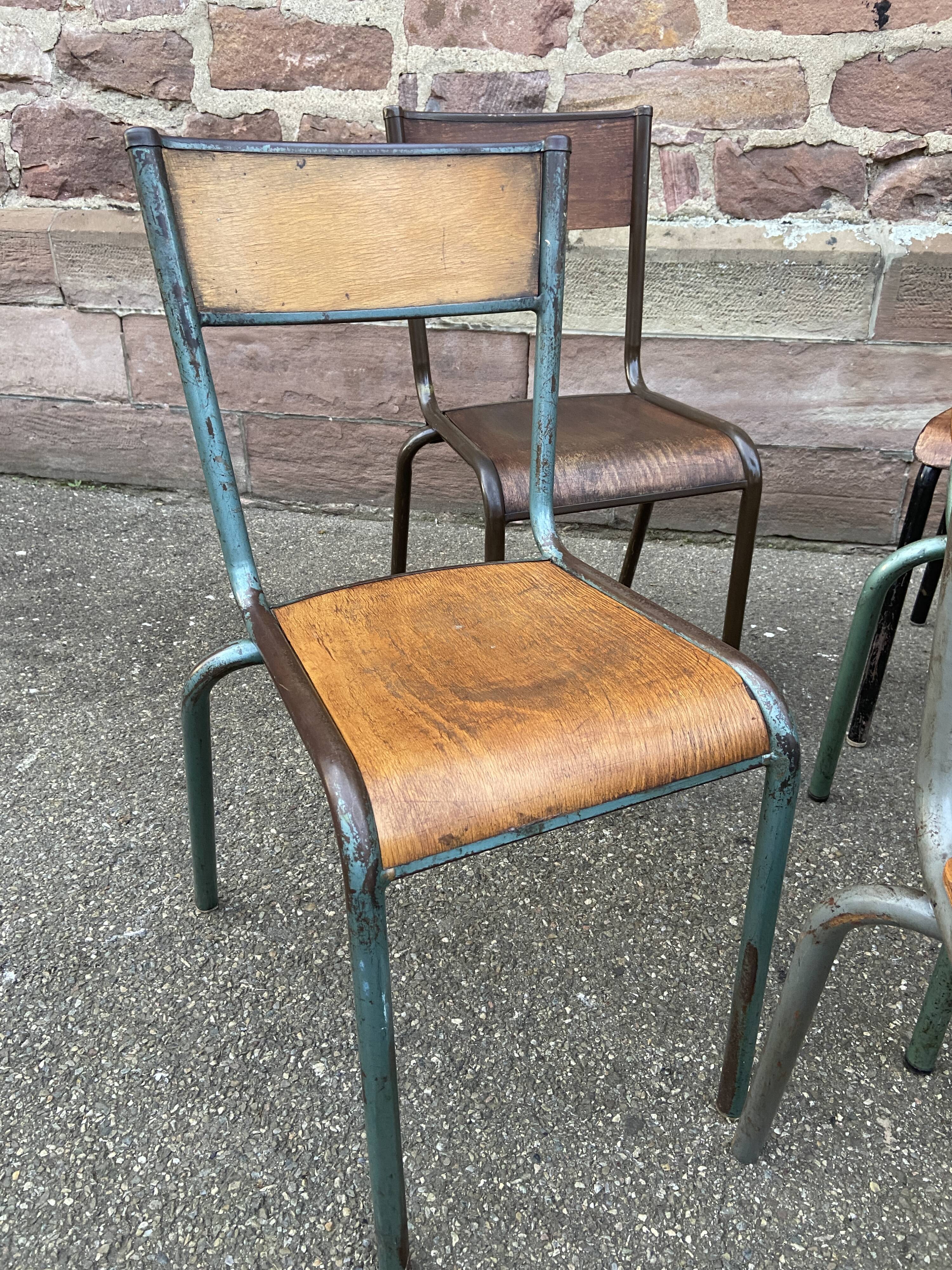 Set of 10 vintage mismatched industrial chairs mullca