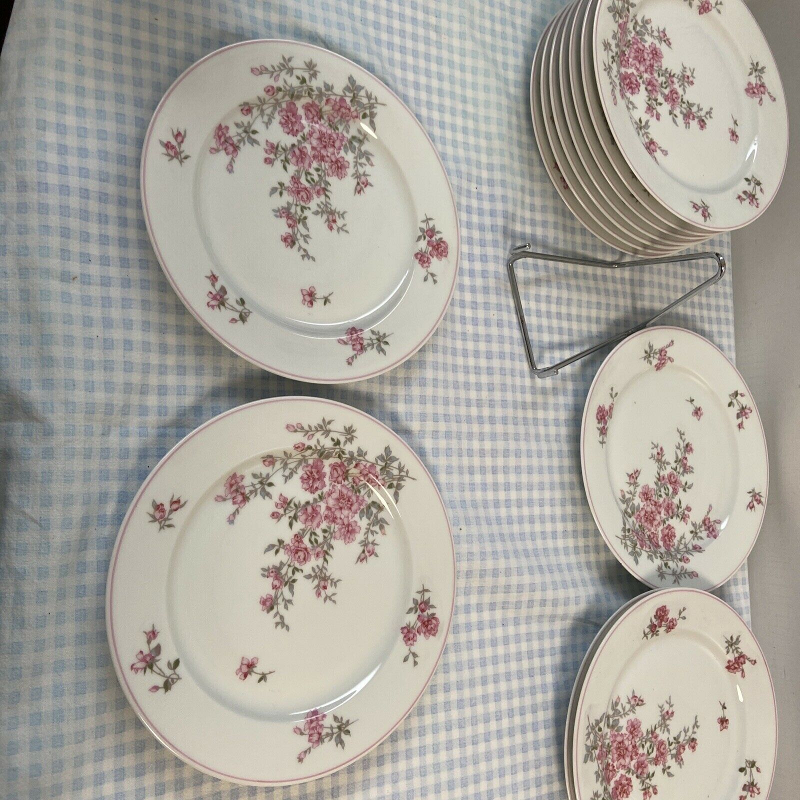 Series of 12 porcelain dessert plates decorated with flowers Bernardaud Limoges