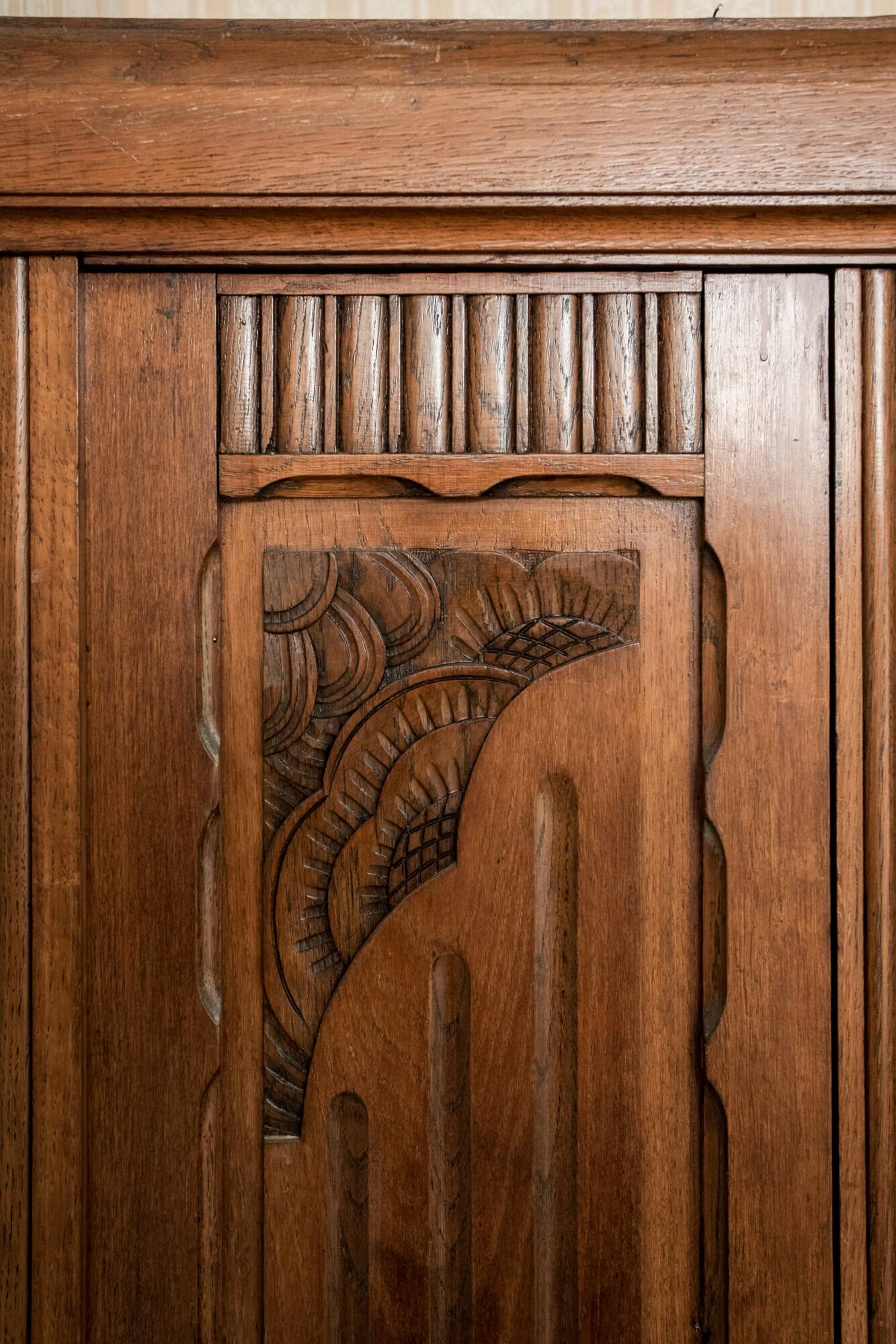 Old solid wood wardrobe with three vintage mirror doors
