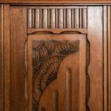 Old solid wood wardrobe with three vintage mirror doors