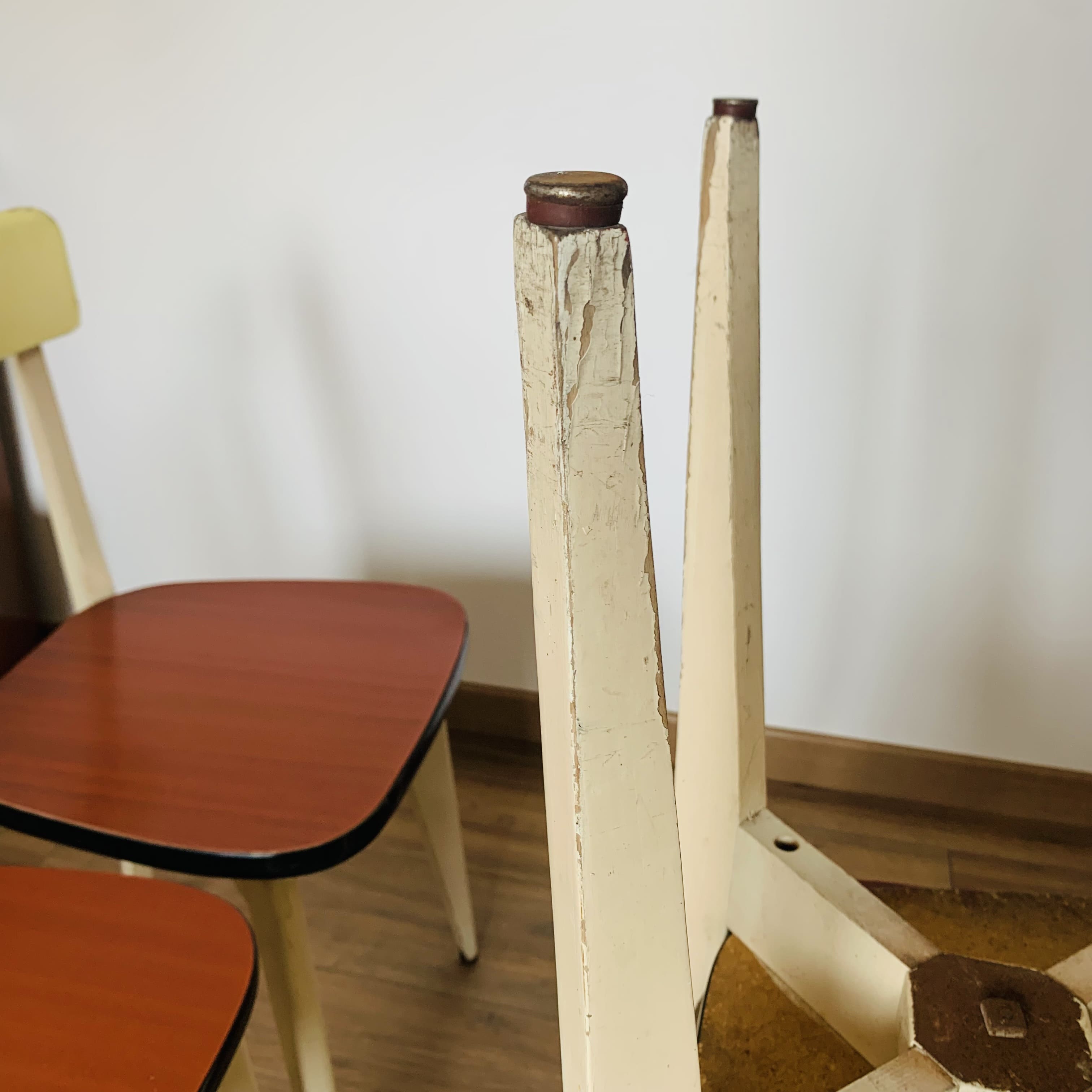 4 wooden chairs and formica kitchen