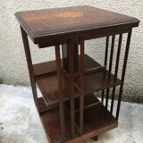 Revolving english library in mahogany, wheeled footing