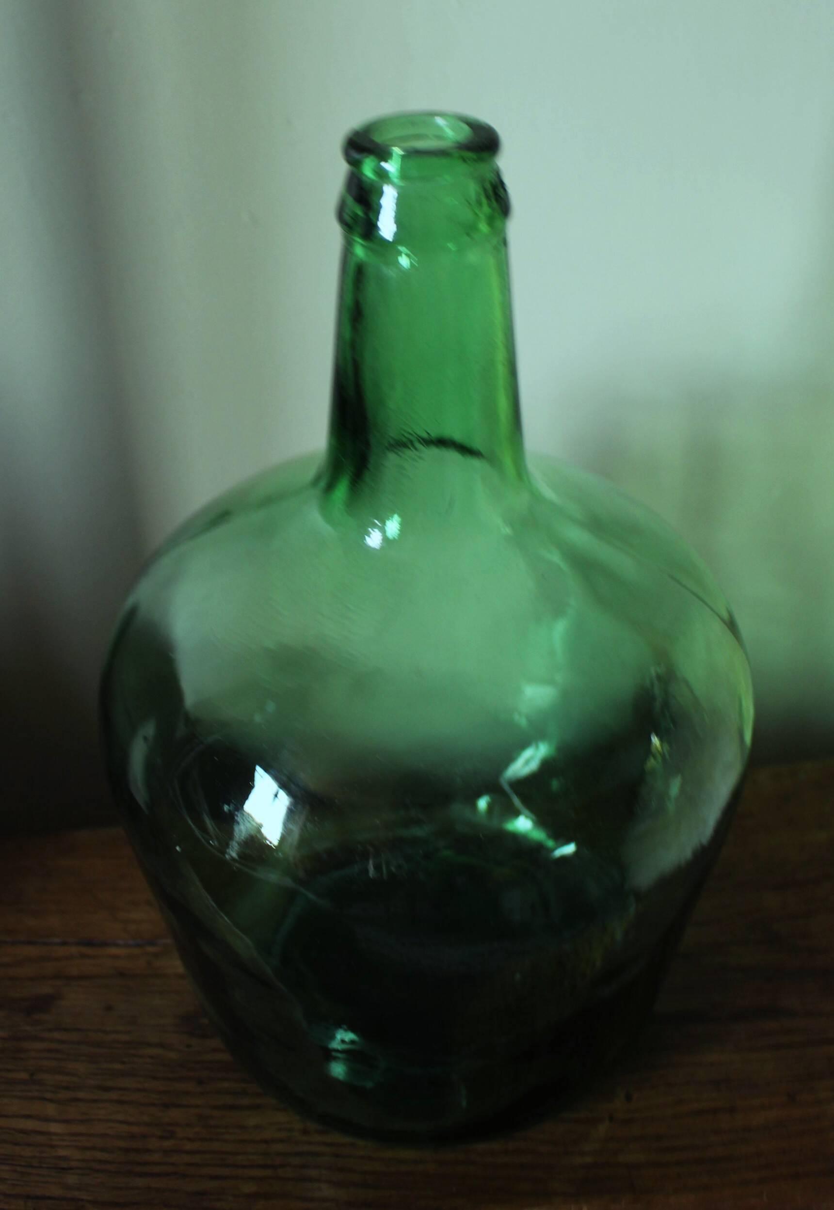 Give me a dark green glass Bonbonne jar.