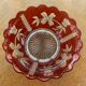 Red and transparent glass bowl with floral motifs and vintage wheat cobs