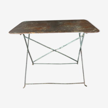 Copper patinated metal garden table