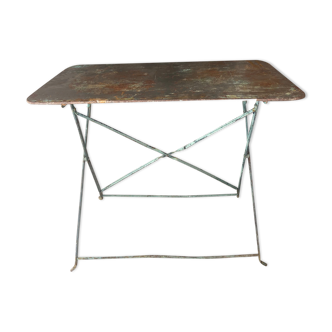 Copper patinated metal garden table