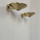 Pair of solid brass wall sconces, France, 1970.