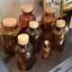Lot de 7 flacons d'apothicaire