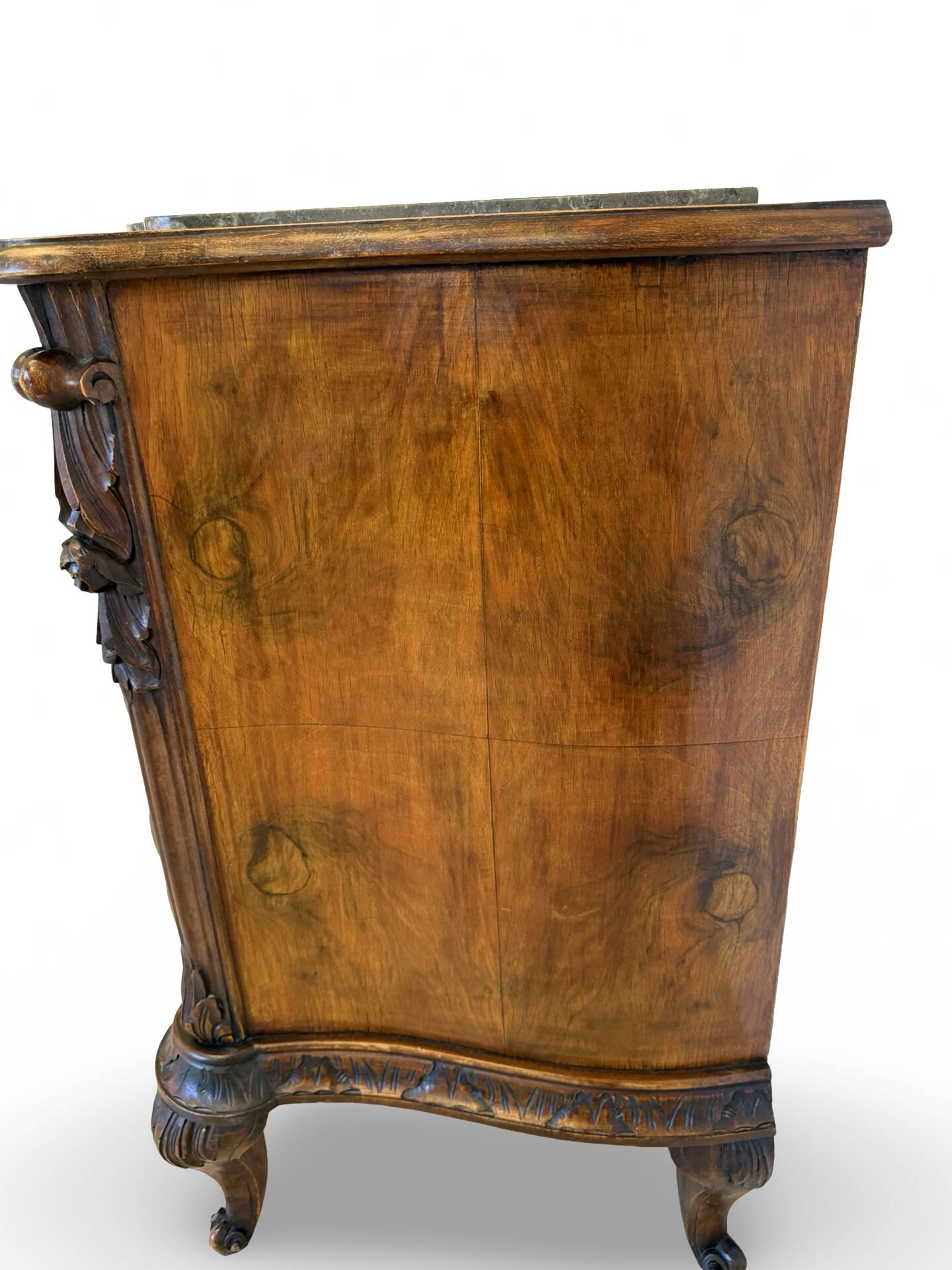 serpentine commode in antique walnut
