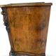 serpentine commode in antique walnut