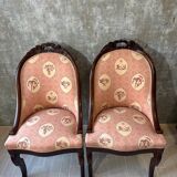 Pair of carved solid mahogany gondolas from the 19th century