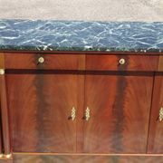 Flamed mahogany enfilade with sea green marble in Empire style.