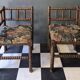 Old pair of corner chairs known as 'fireplace corner' armchairs.