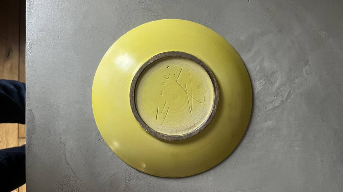 Yellow ceramic plate by Georges Jouve