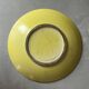 Yellow ceramic plate by Georges Jouve
