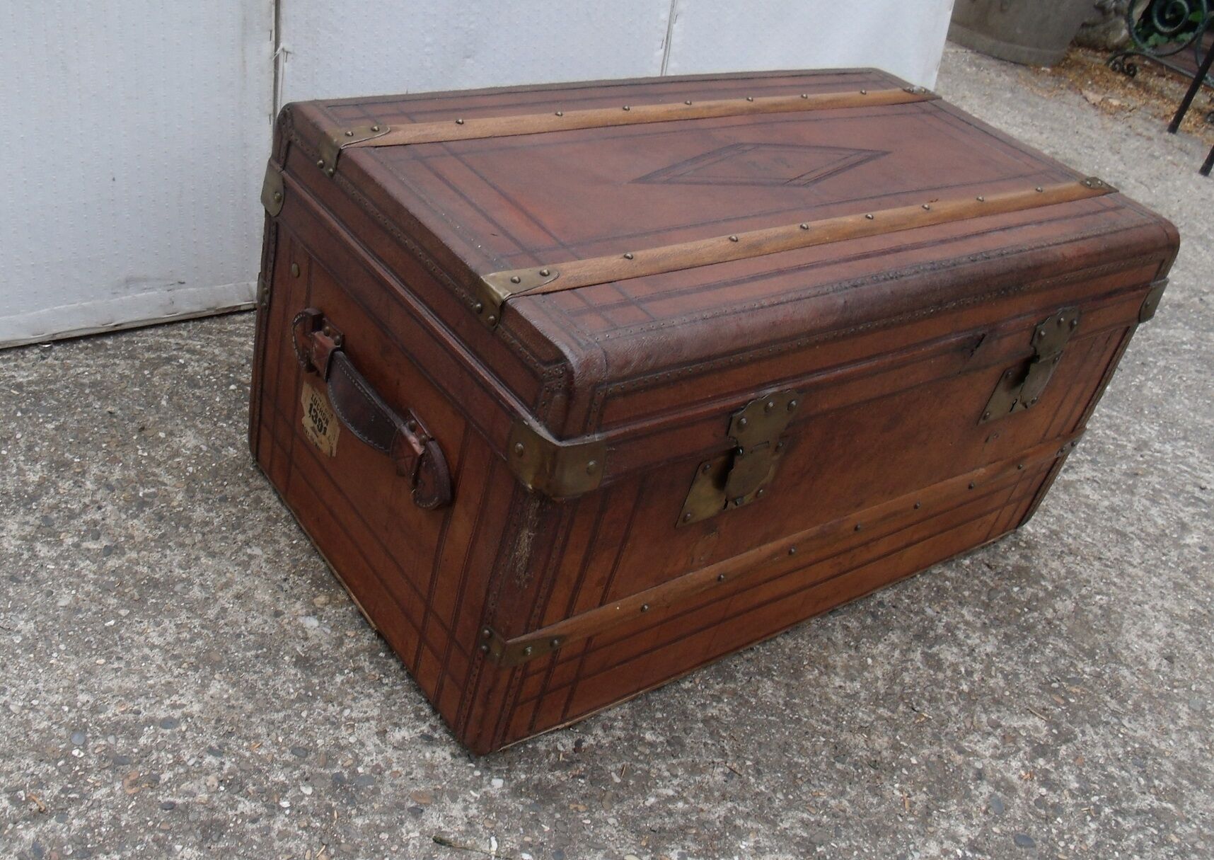 Old wooden trunk covered leather travel chest