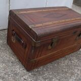 Old wooden trunk covered leather travel chest