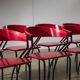 Red Plywood and Curved Metal Frame Chair