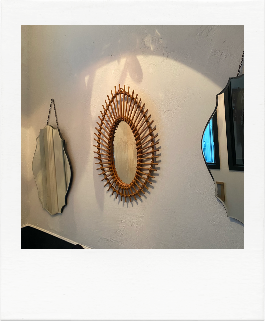 Vintage rattan sun mirror