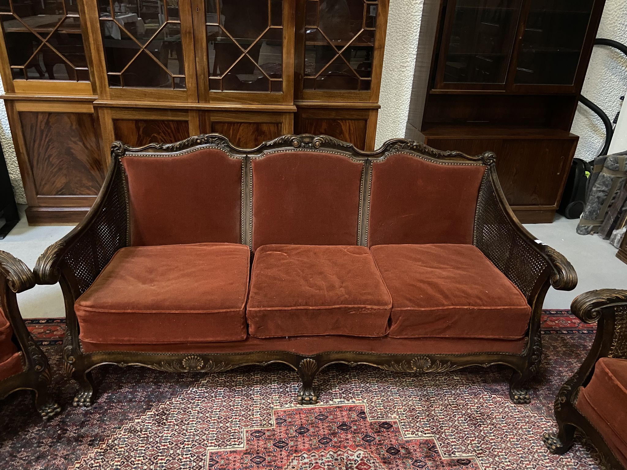 Baroque living room in burgundy velvet and wood