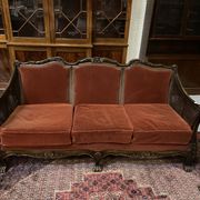 Baroque living room in burgundy velvet and wood