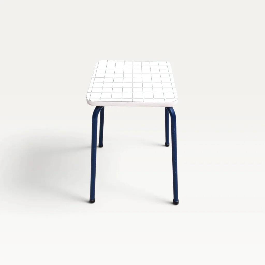 Vintage 80s melamine stool in navy blue checkered pattern.