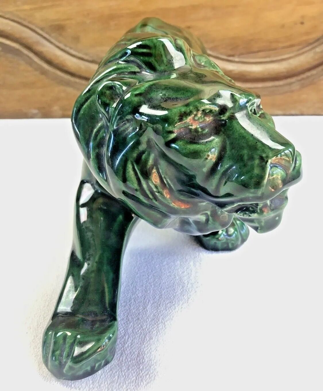 Art Deco lion statue 1930 cracked Saint Clement