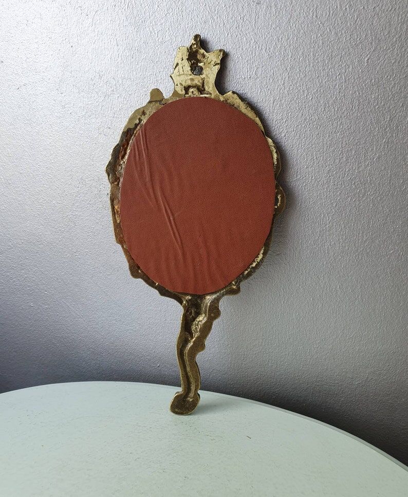 Hand mirror in brass art deco 30 years France
