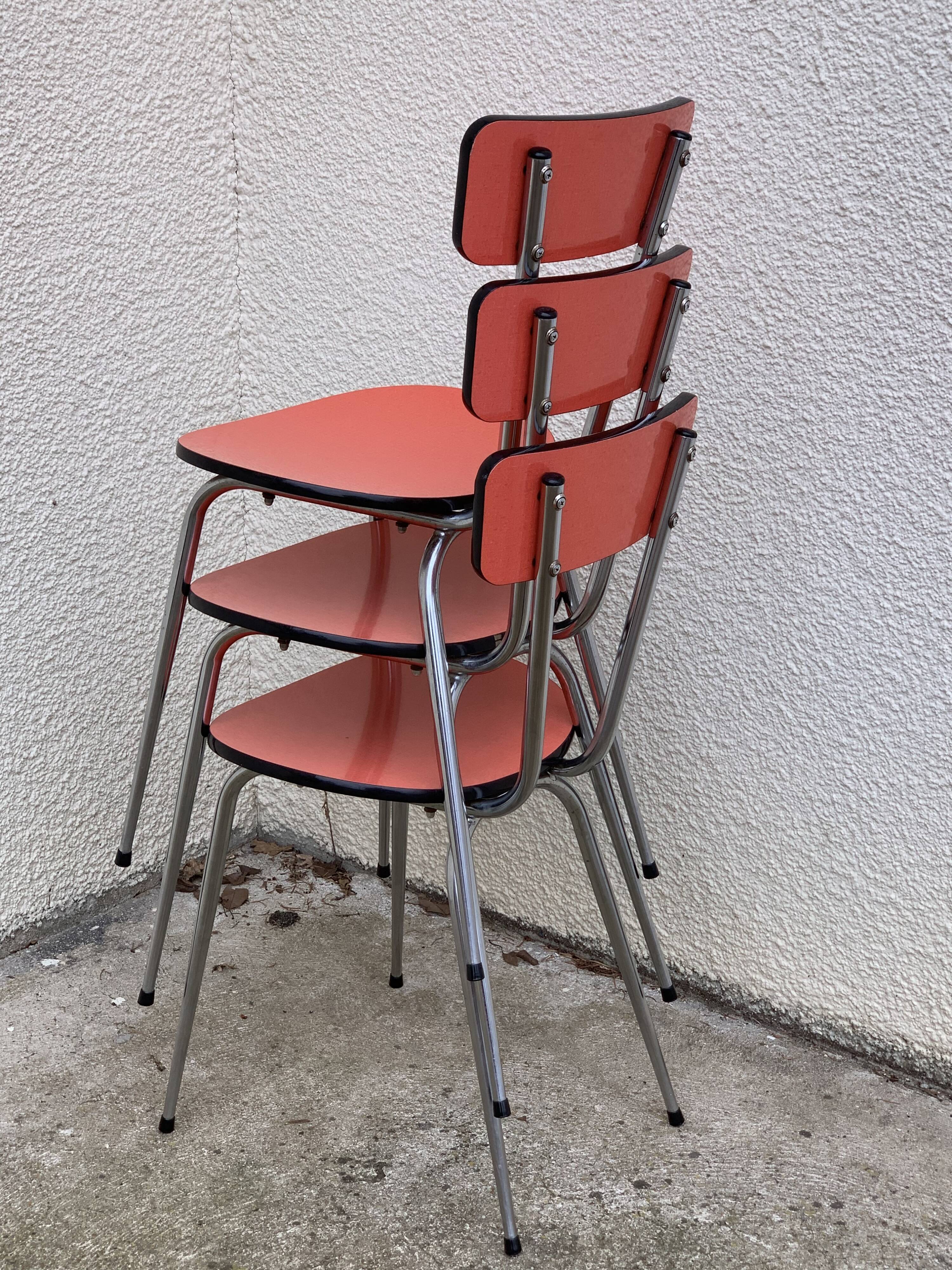 Red formica chairs 1950