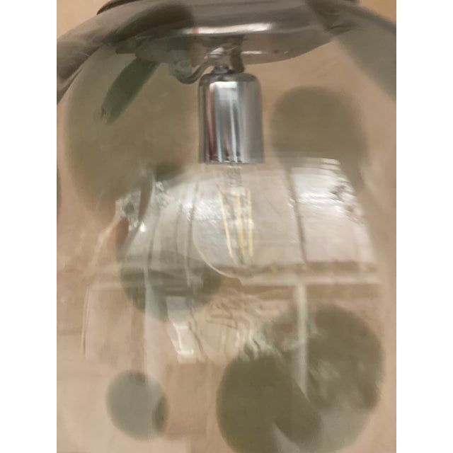 1990s contemporary olive-green and transparent sphere in murano glass