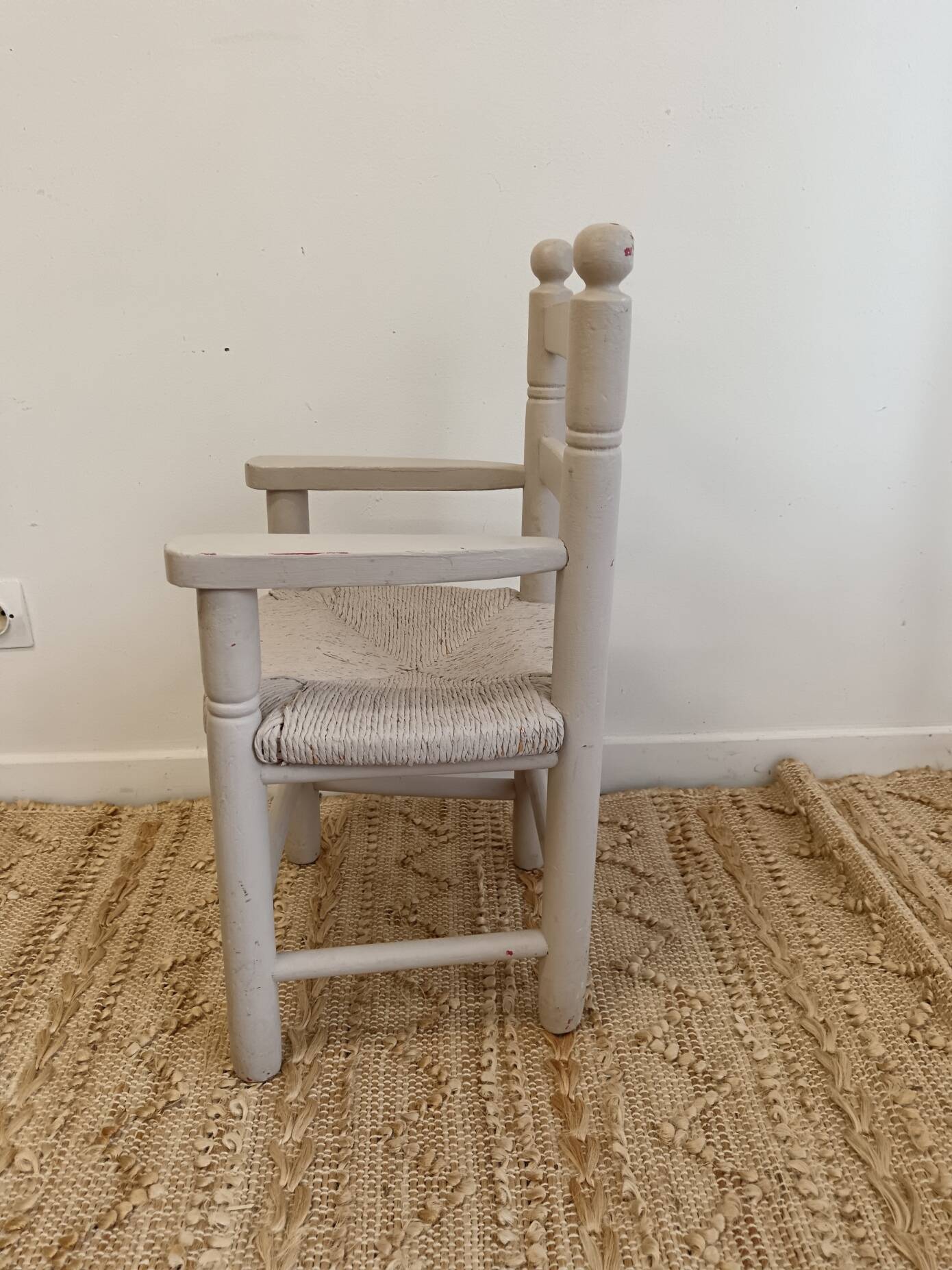 Grey patinated children's armchair with straw seat