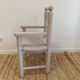 Grey patinated children's armchair with straw seat