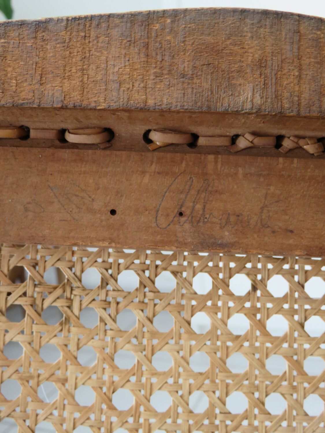 Antique solid wood chair with caning, country house style.